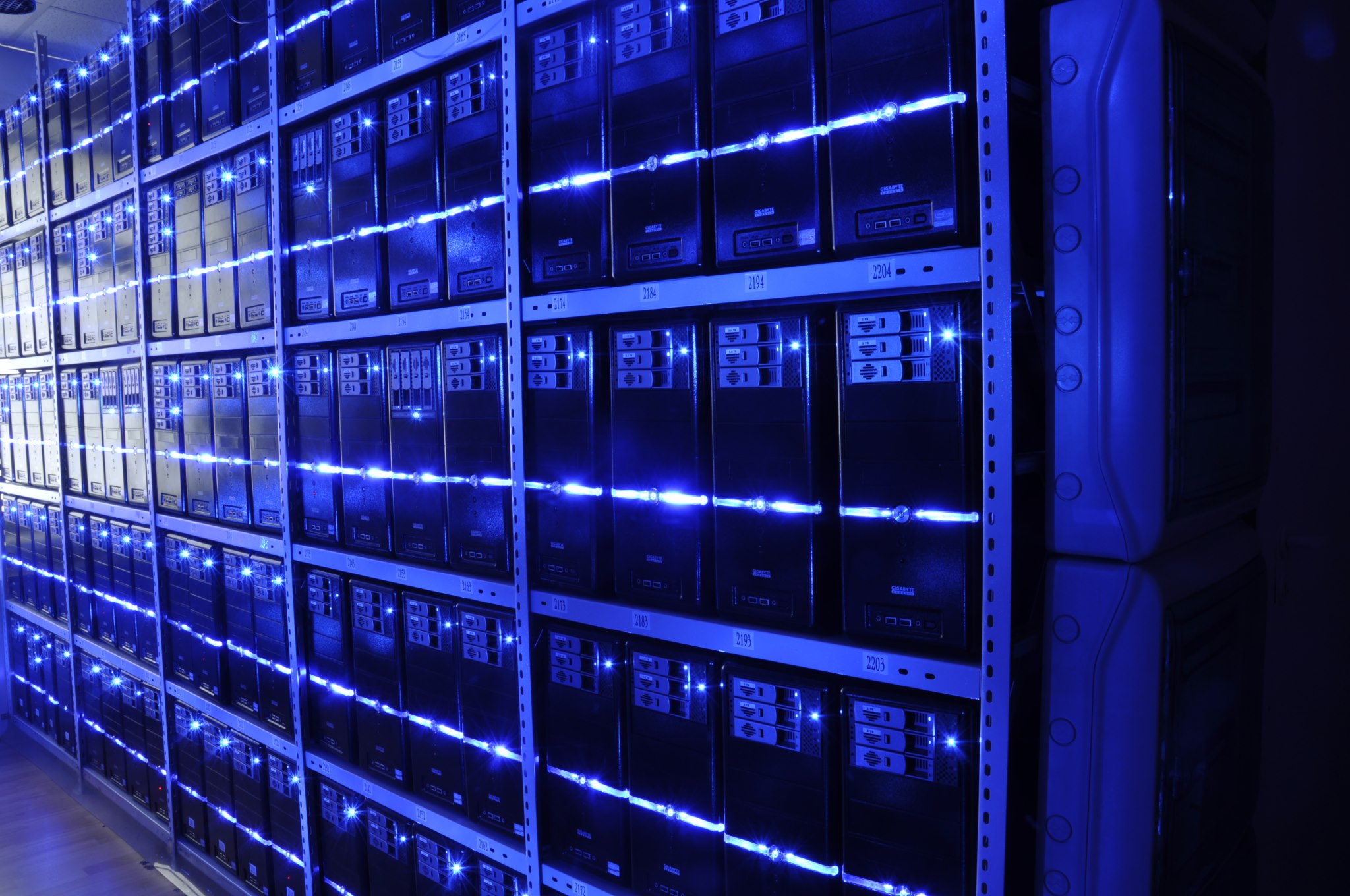 High-density data center aisle housing GPU compute racks